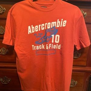 NWT Boys Abercrombie t shirt size large. Orange.